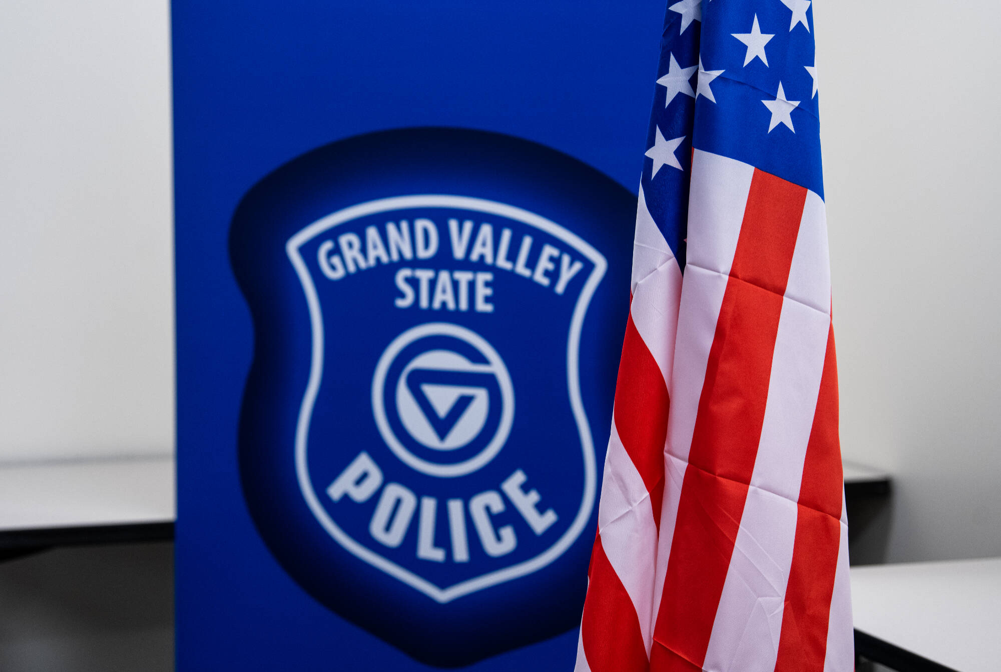 GVSU Safety Logo and the American Flag